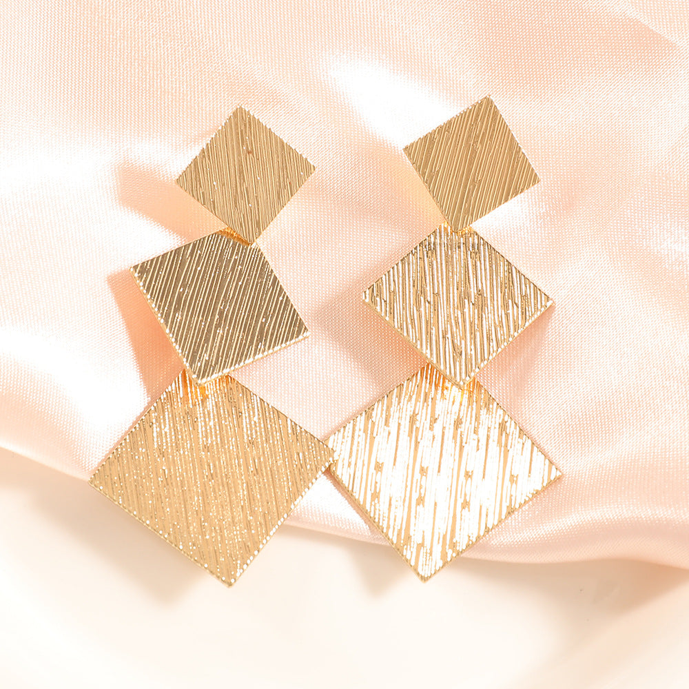 Women's Fashion Design Metal Glossy Surface Folding Ear Stud Earrings