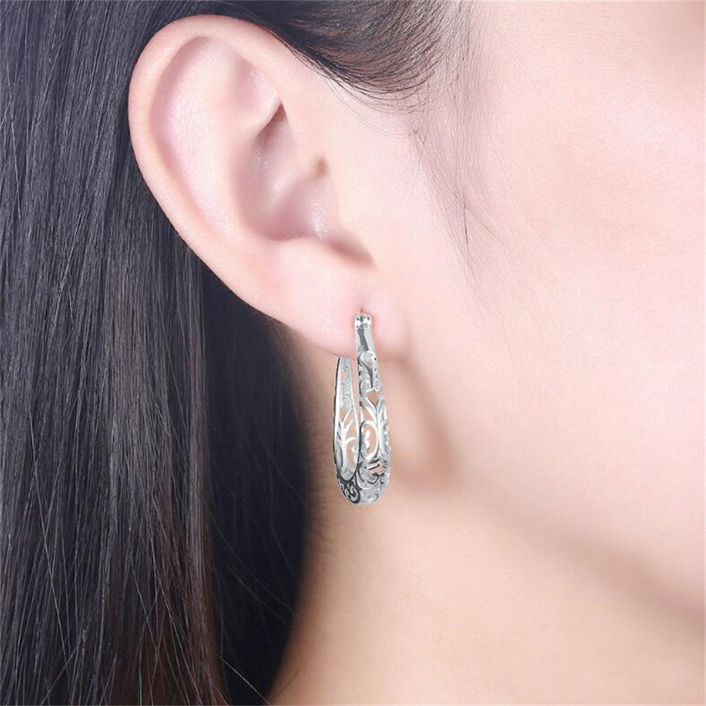 Hollow Flower-shaped High Profile Retro Clip Ear Buckle