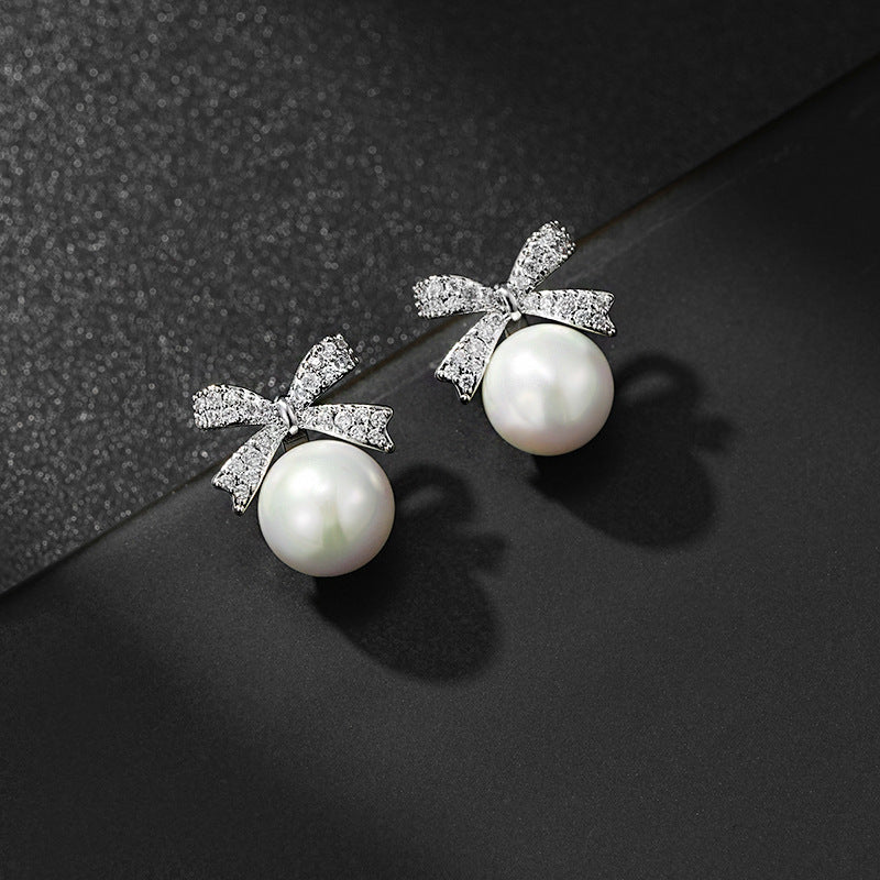 Women's Korean Style Sier Pin Simple Niche Personality Bow Elegant High-grade Stud Earrings