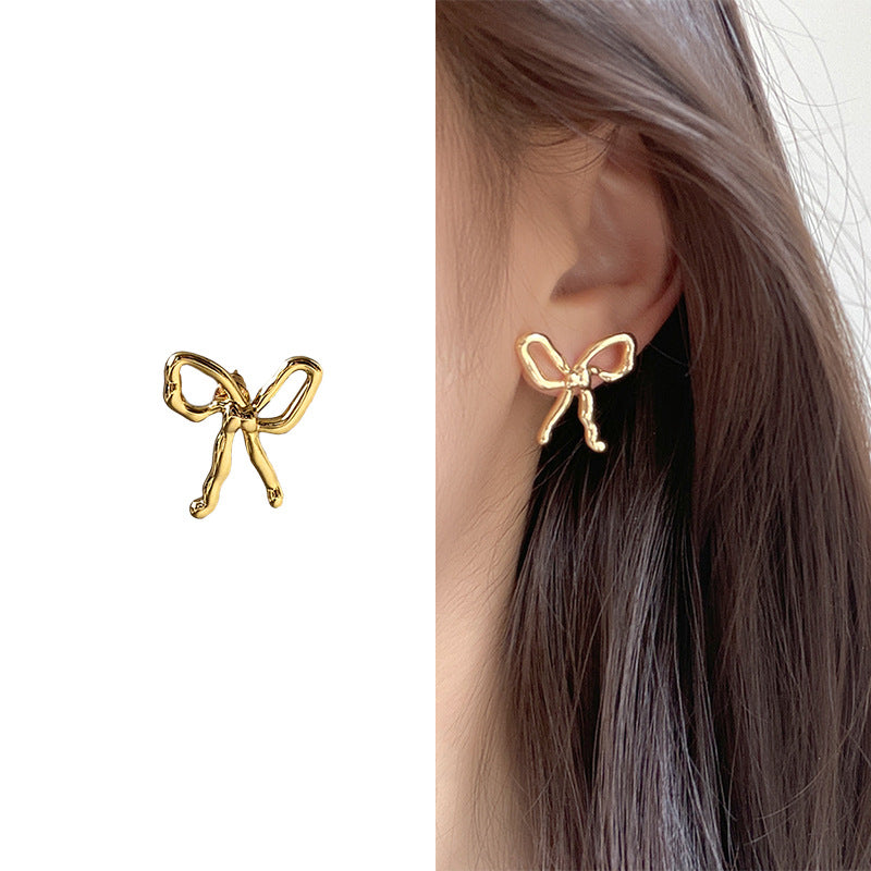Korean Sweet Wave Bow Exquisite Versatile Commuter Simple Hollow Line Stud Earrings