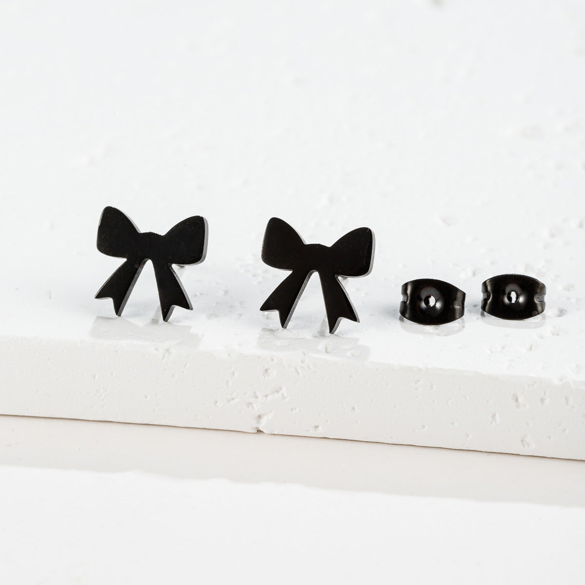 Women's Fashion Stainless Steel Personality Simple Style Bowknot Stud Earrings