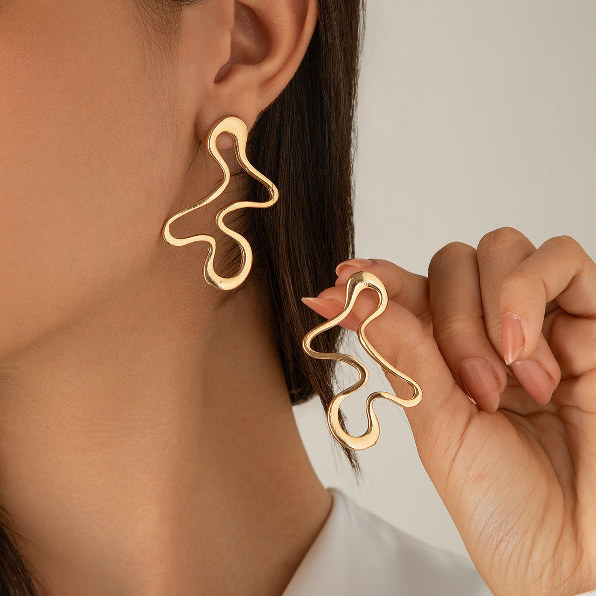 Women's Style Exaggerated Irregular Ear Punk Metal Fold Water Stud Earrings