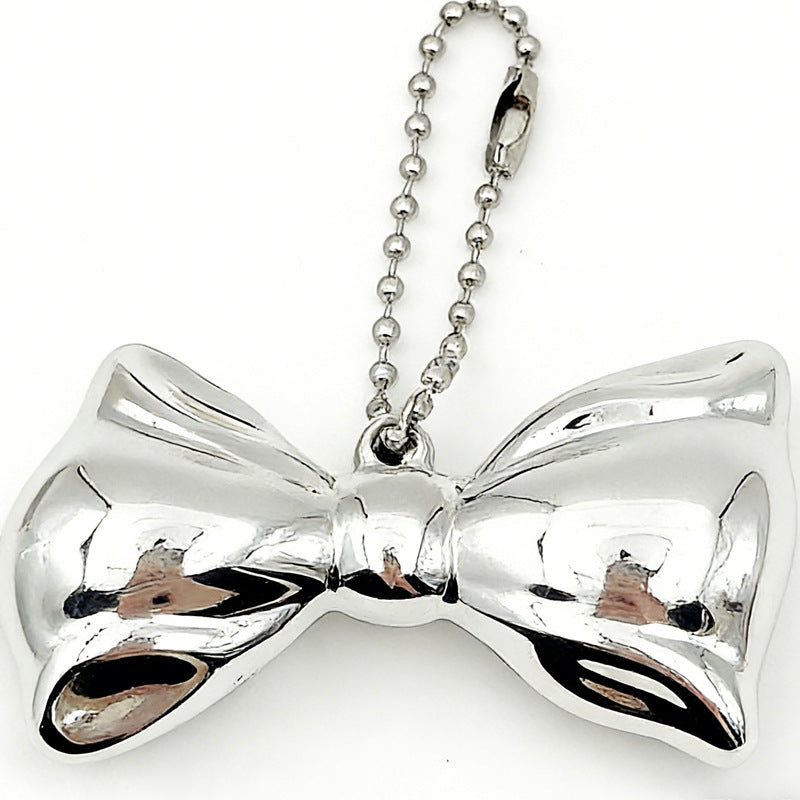 Women's Simple Sier Bow Metal Sweet High-grade Personality Sweater Pendants