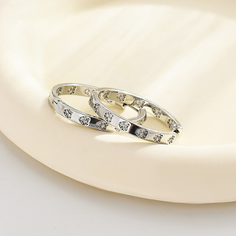 Female Exaggerated Simple Round High Sense Clip Refined Earrings