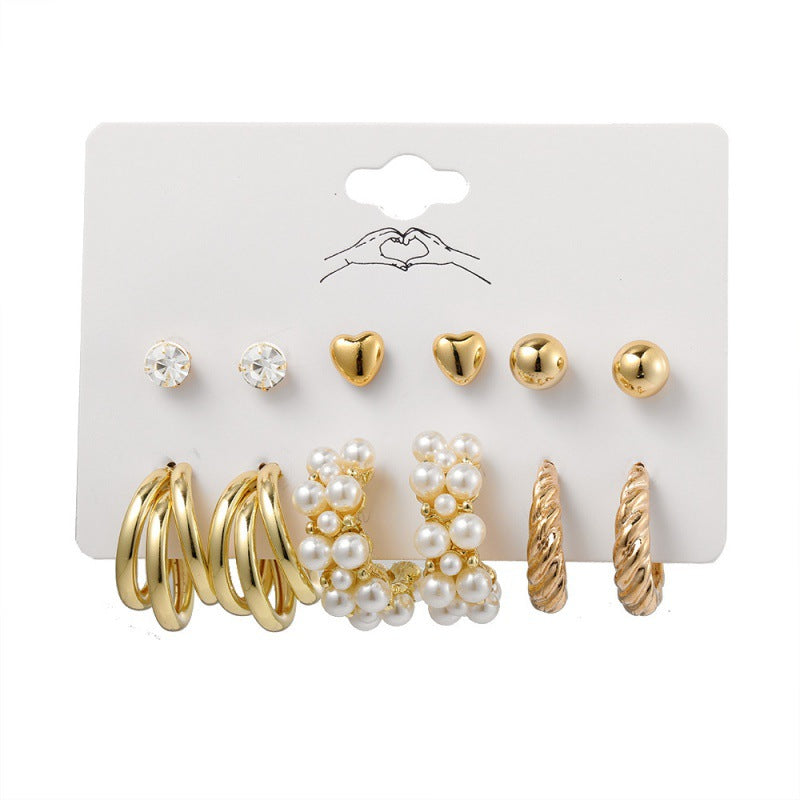 Women's Inlaid Pearl Twist Temperament Pieces Creative Retro Golden Rings
