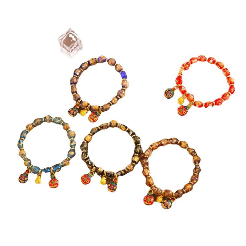 Gray Colored Glaze Gold Foil Swallowing Beast Ethnic Style Bracelets