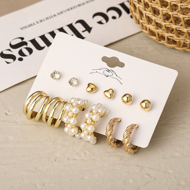 Women's Inlaid Pearl Twist Temperament Pieces Creative Retro Golden Rings
