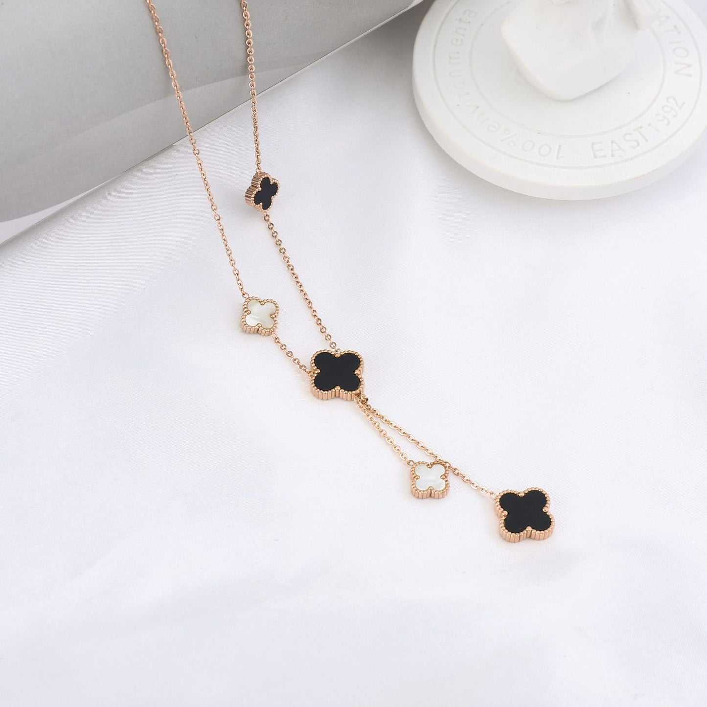 Women's Korean Simple Double-sided Clover Tassel Titanium Necklaces