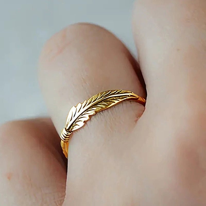 Female Vintage Zircon Distressed Feather Light Rings