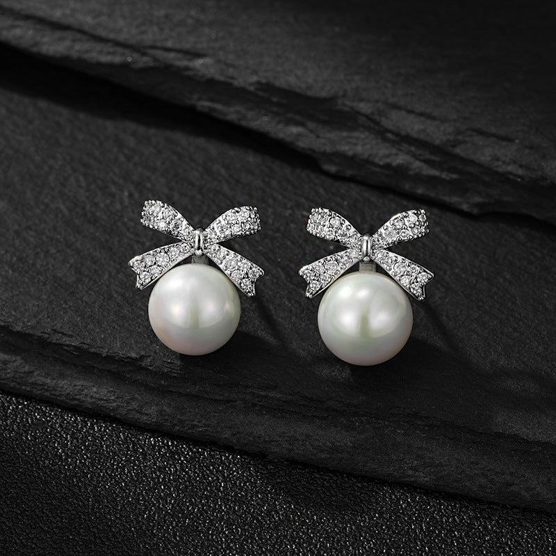Women's Korean Style Sier Pin Simple Niche Personality Bow Elegant High-grade Stud Earrings