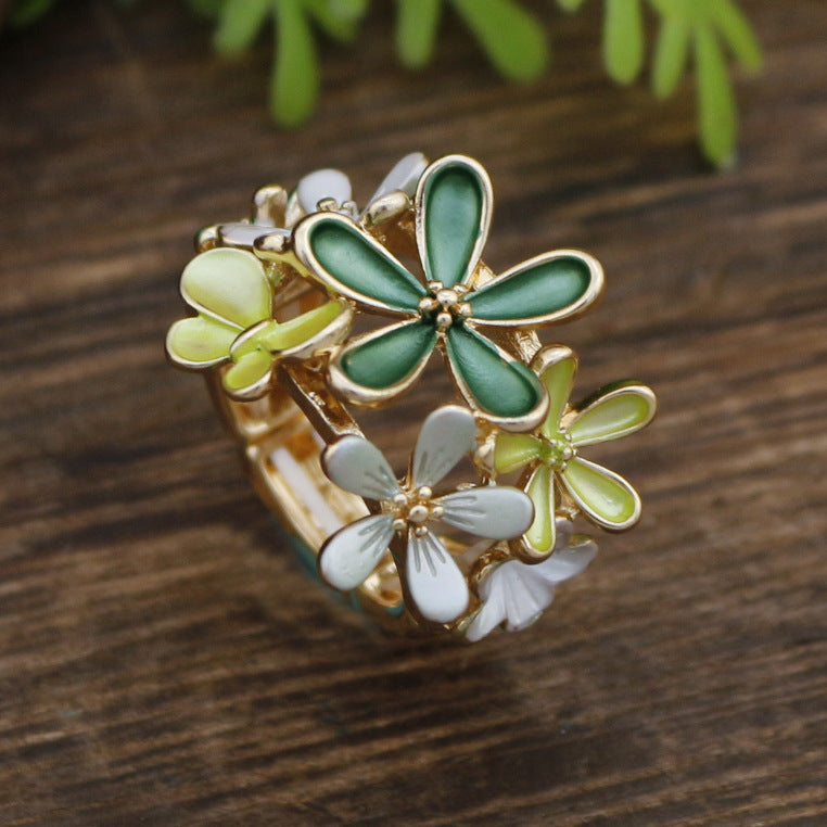 Women's Enamel Irregular Small Flower Elastic Fashion Rings