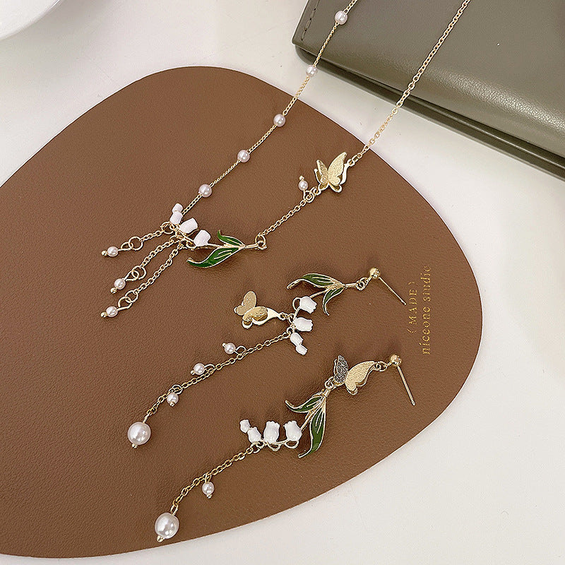 Women's Sier Needle Personality Asymmetric Lily Butterfly Niche Fresh Pure Design Necklace