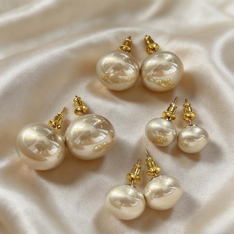 Women's Retro Elegant Champagne Flat Round Steamed Bread Pearl High-grade Niche Stud Earrings