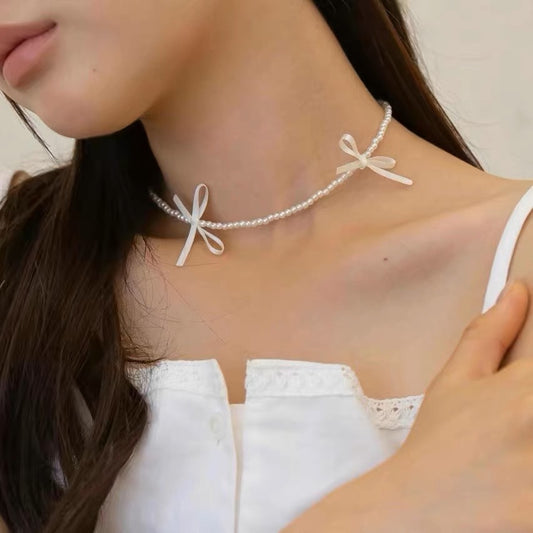 Bow String Pearl Female Temperament Titanium Necklaces
