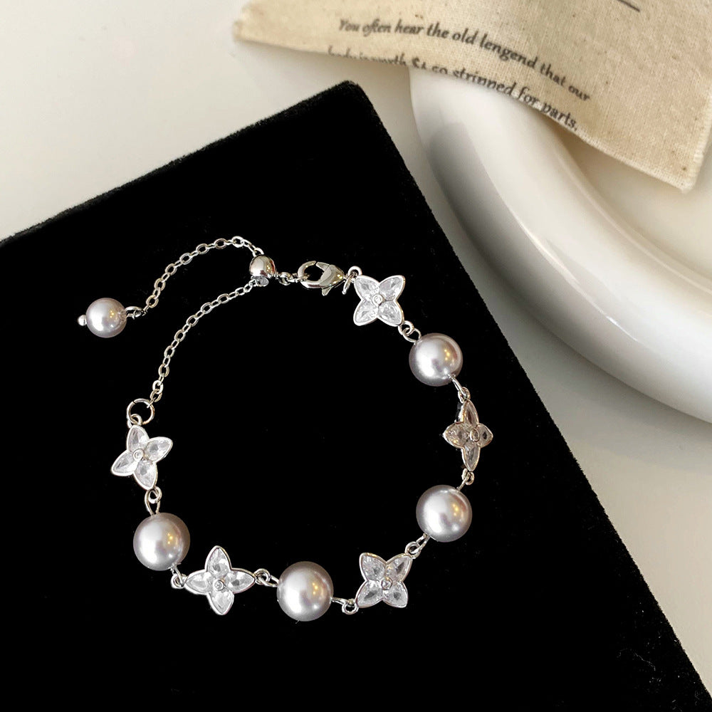 Women's Inlay Fritillary Four-leaf Flower Pull-out Light Luxury High-grade Bracelets