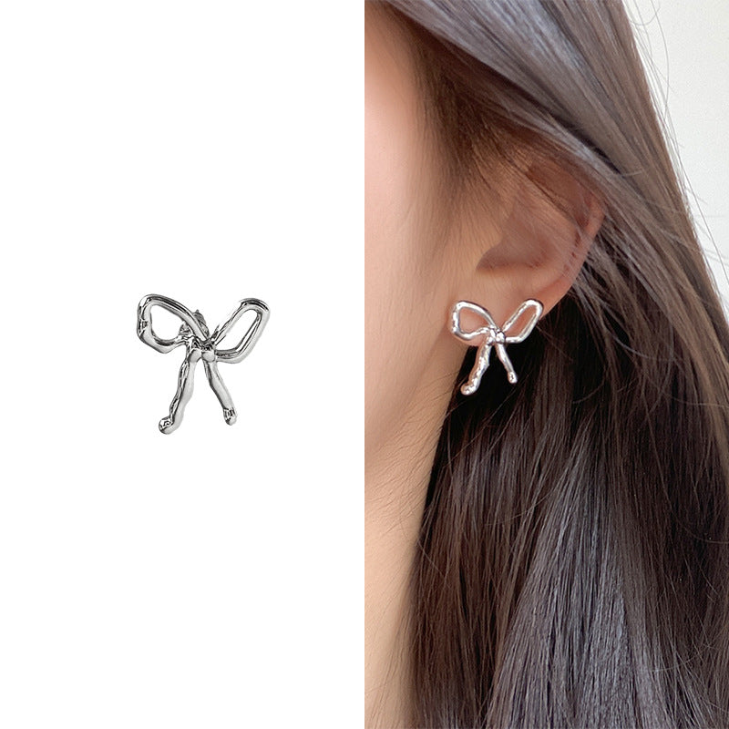 Korean Sweet Wave Bow Exquisite Versatile Commuter Simple Hollow Line Stud Earrings