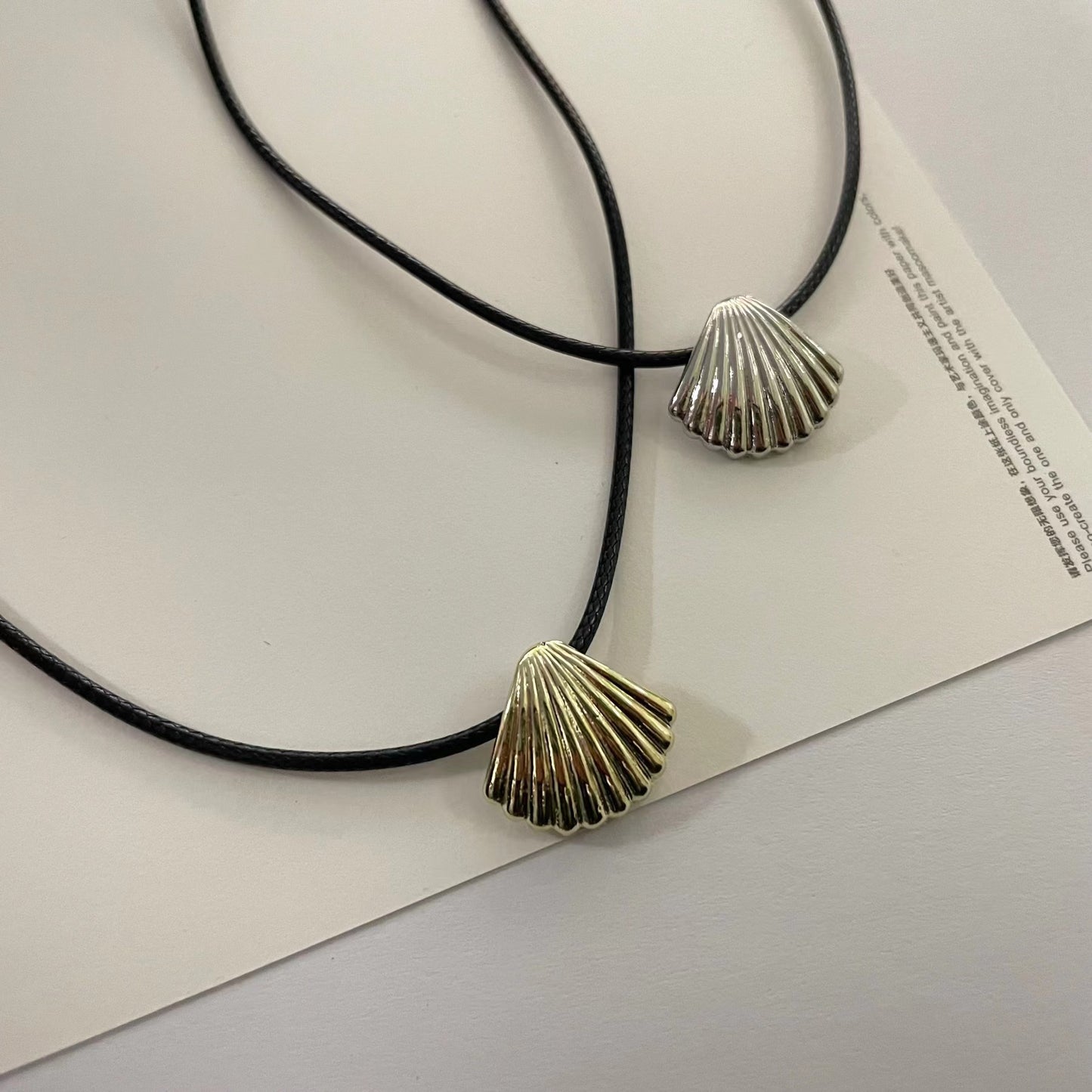 Women's Metal Fan-shaped Shell-shaped High-grade Cold Wind Sier Stud Earrings