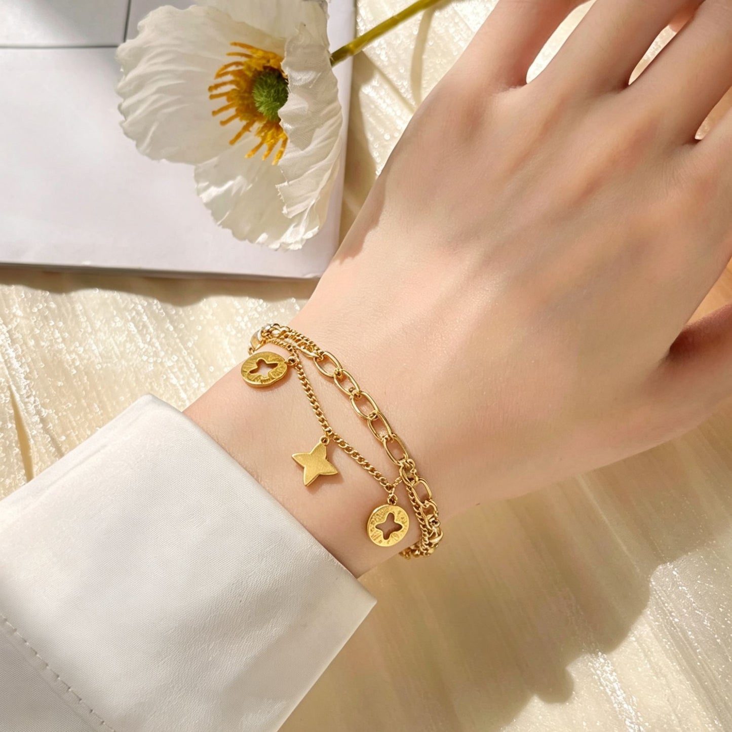 Golden Hollow Four-leaf Clover Tassel Titanium Steel Does Bracelet