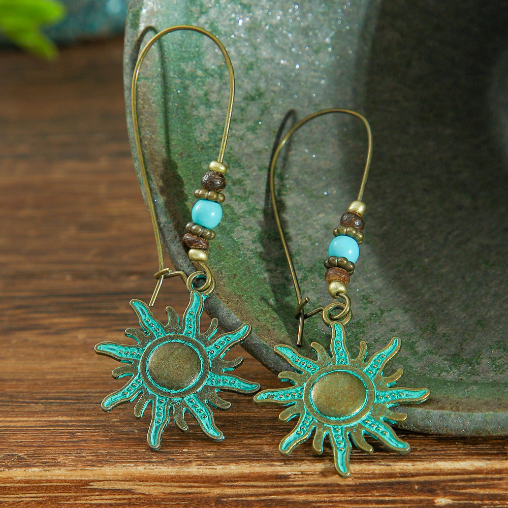 Ancient Bronze Metal Exaggerated Carved Female Earrings
