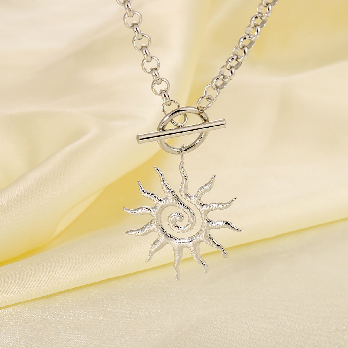 Women's Stainless Steel Rotating Sun Simple Retro Pendants