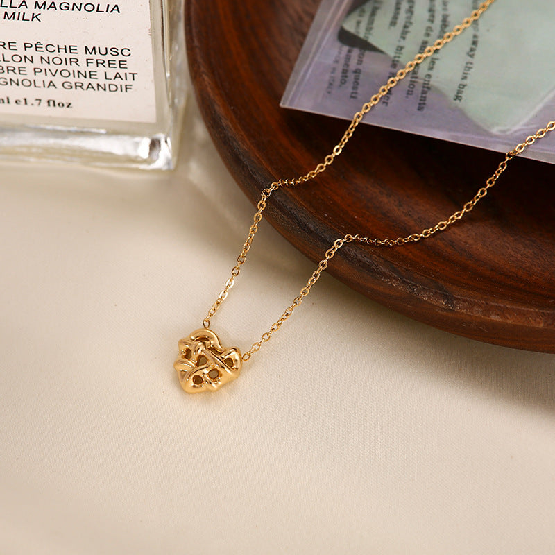 Winding Heart Style Gold-plated Titanium Steel Woven Peach Necklace