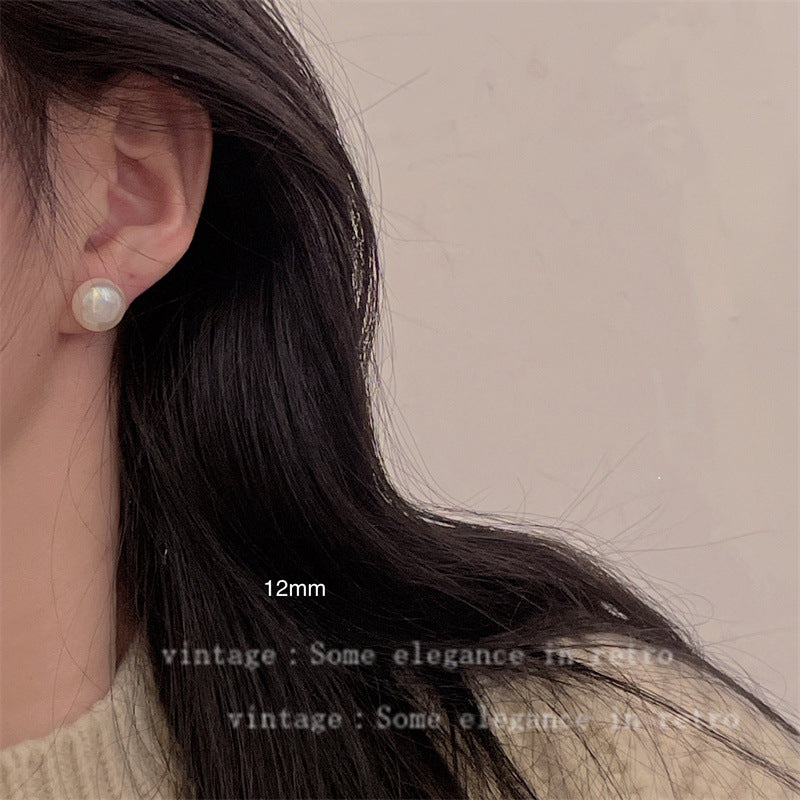 Women's Mosquito Coil Ear Clip High-grade Steamed Bread Pearl Minority Earrings