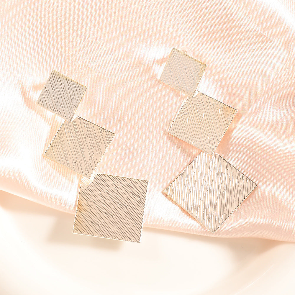 Women's Fashion Design Metal Glossy Surface Folding Ear Stud Earrings