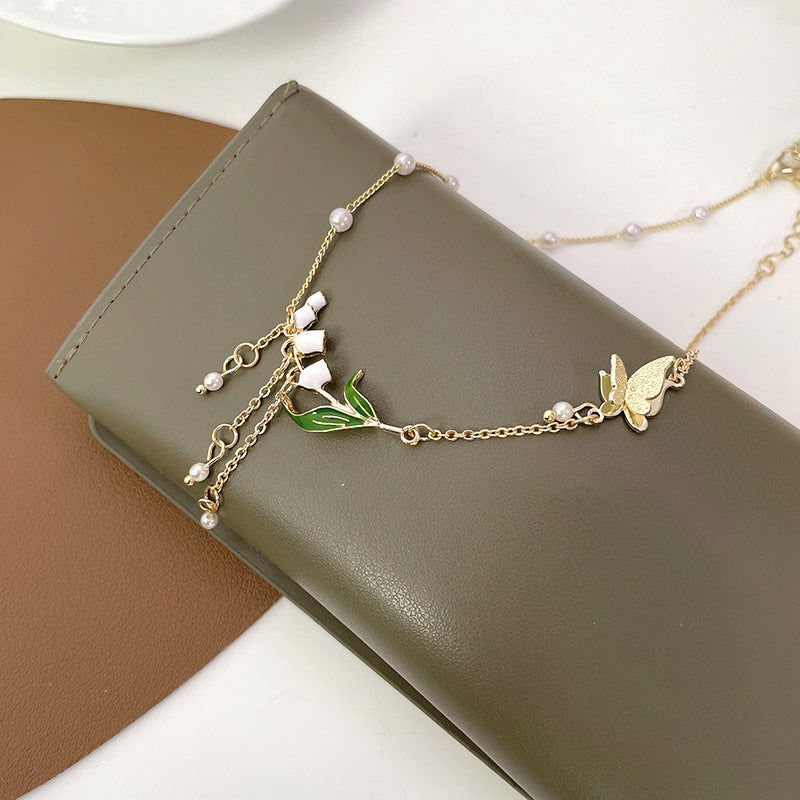 Women's Sier Needle Personality Asymmetric Lily Butterfly Niche Fresh Pure Design Necklace