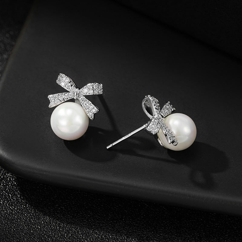 Women's Korean Style Sier Pin Simple Niche Personality Bow Elegant High-grade Stud Earrings