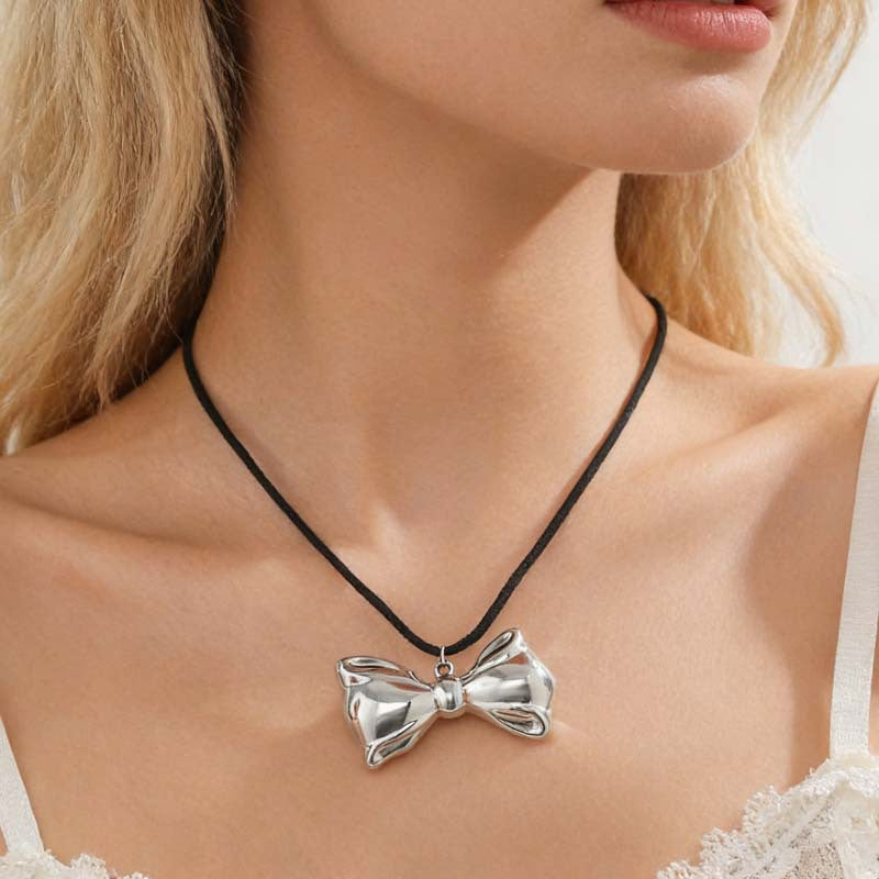 Women's Simple Sier Bow Metal Sweet High-grade Personality Sweater Pendants