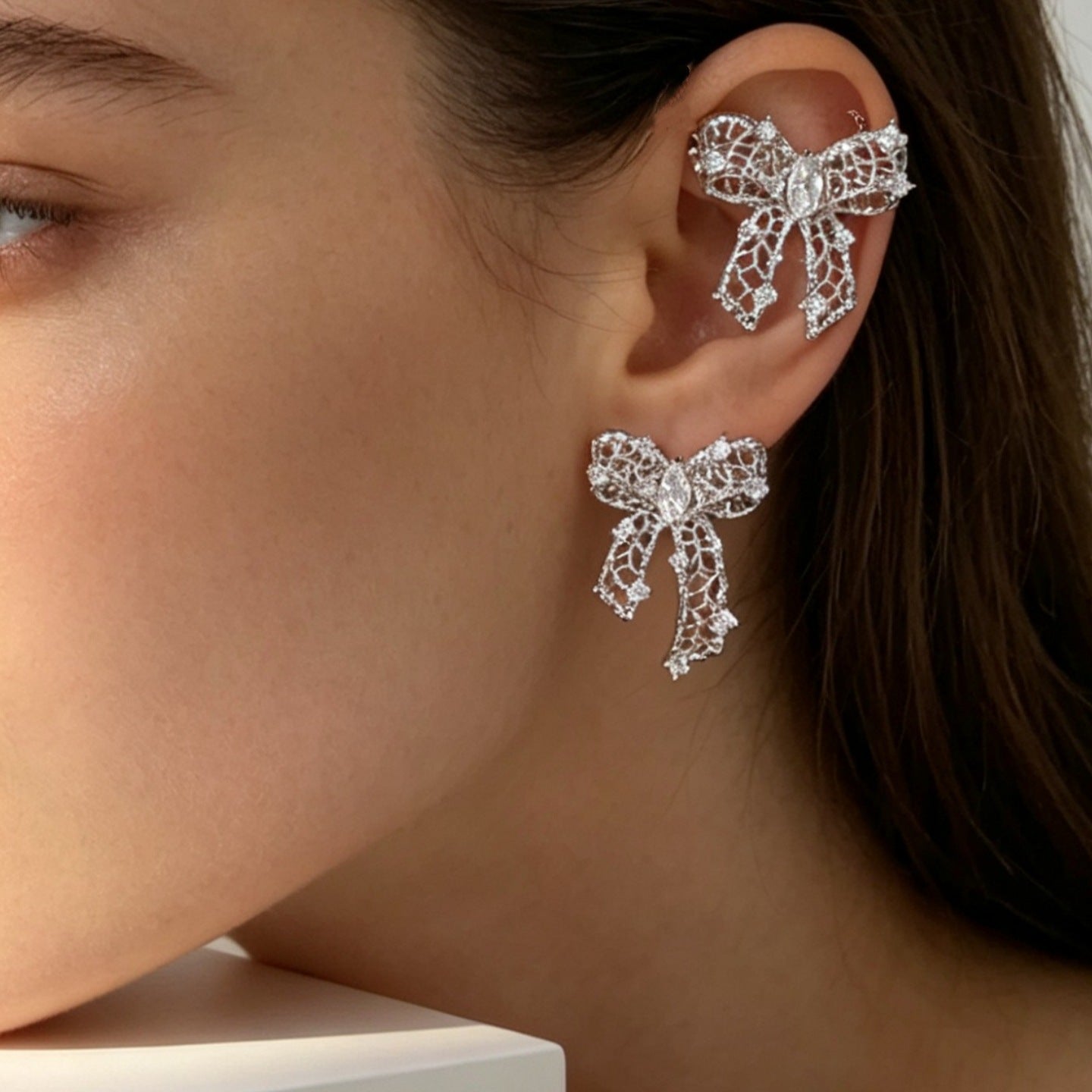 Women's Bow Sier Pearl Ear Clip Hollow Out Niche Zircon Light Earrings