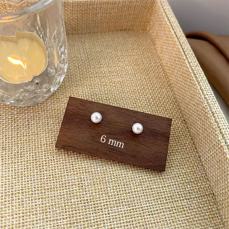 Women's Korean Style Metal Alloy Pearl High-grade Long Stall Light Stud Earrings